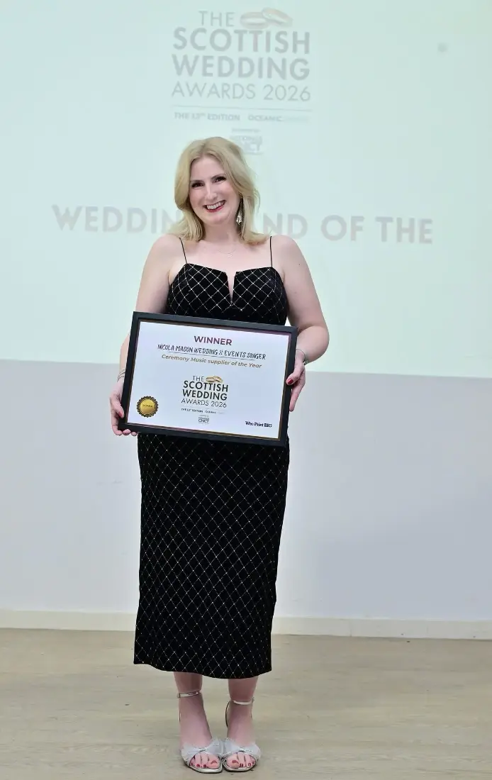 Female wedding singer Nicola Mason performing full day wedding package with live vocals and acoustic guitar in Central Scotland