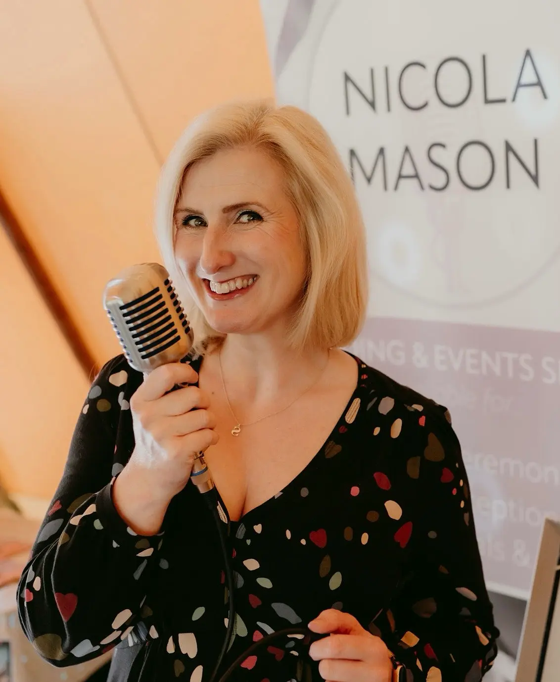 Award-winning female wedding singer Nicola Mason performing live music at Scottish wedding ceremony in Glasgow